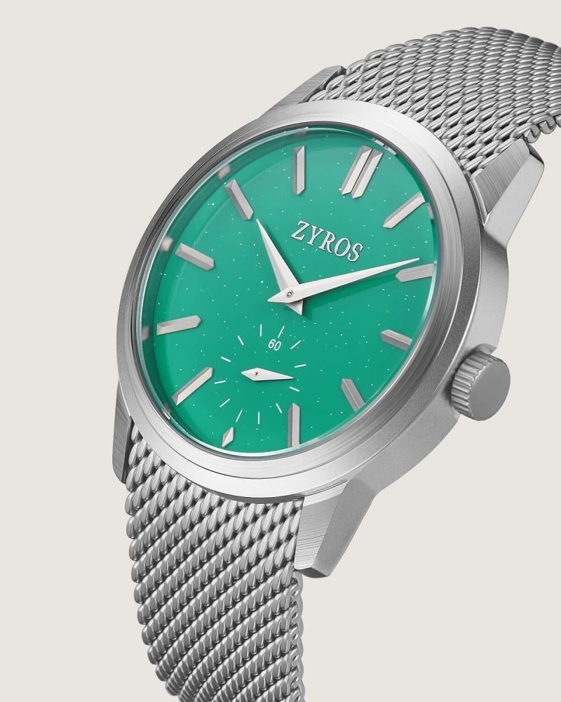 ساعة رجالية بسير شبكي بلون فضي